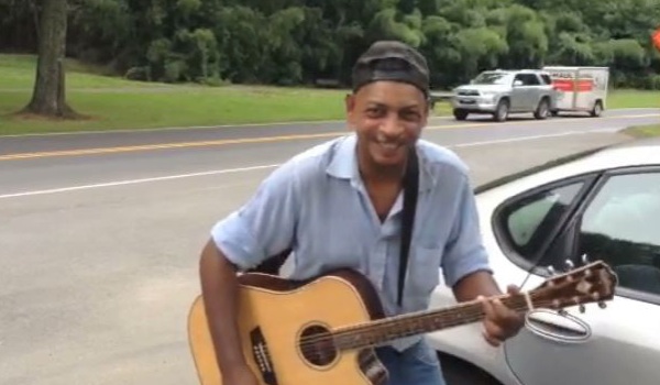 Recovering alcoholic finds God through guitar street performing